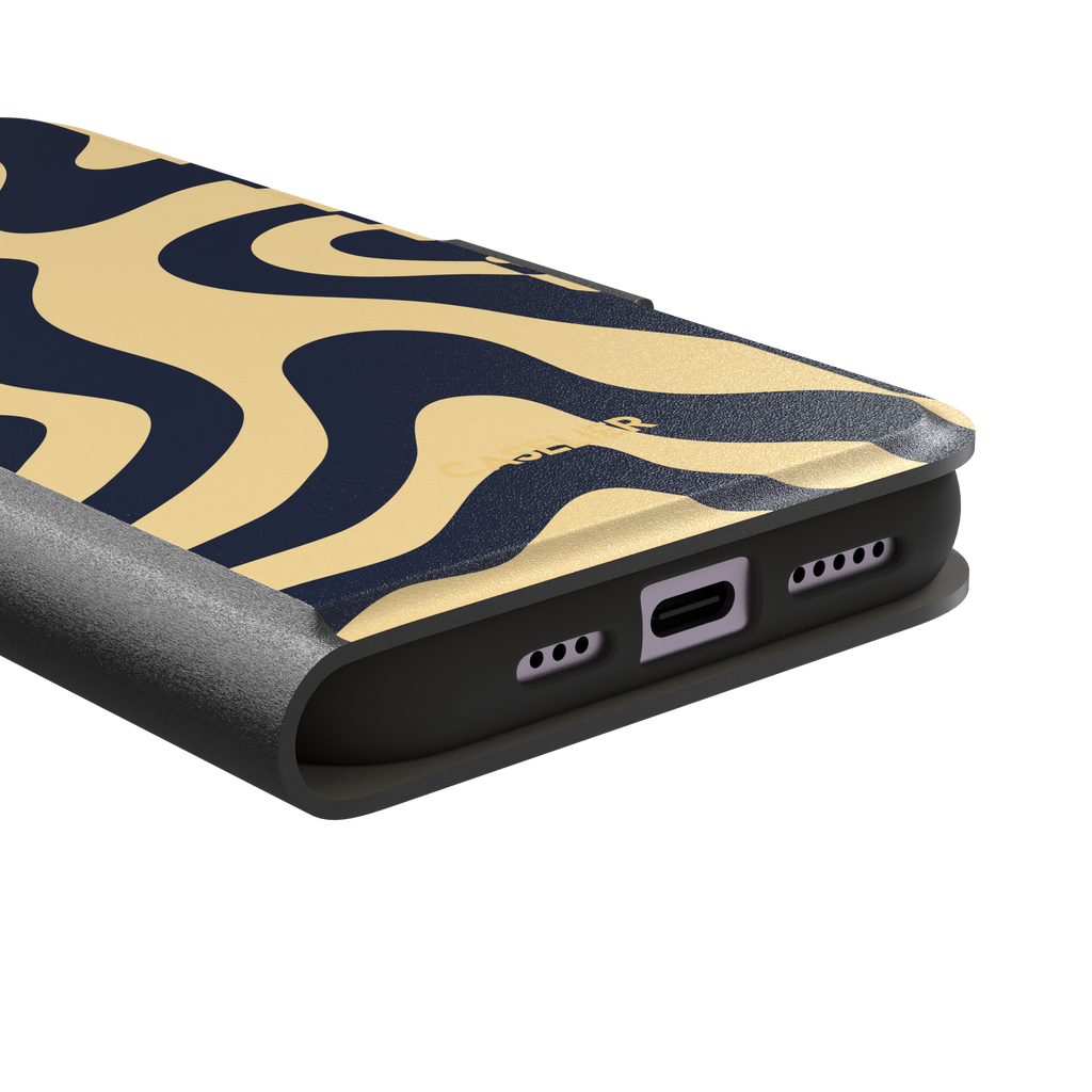 Wavey, wavy swirl pattern in navy blue and cream, wallet case, charging port detail, phone case by Caselier