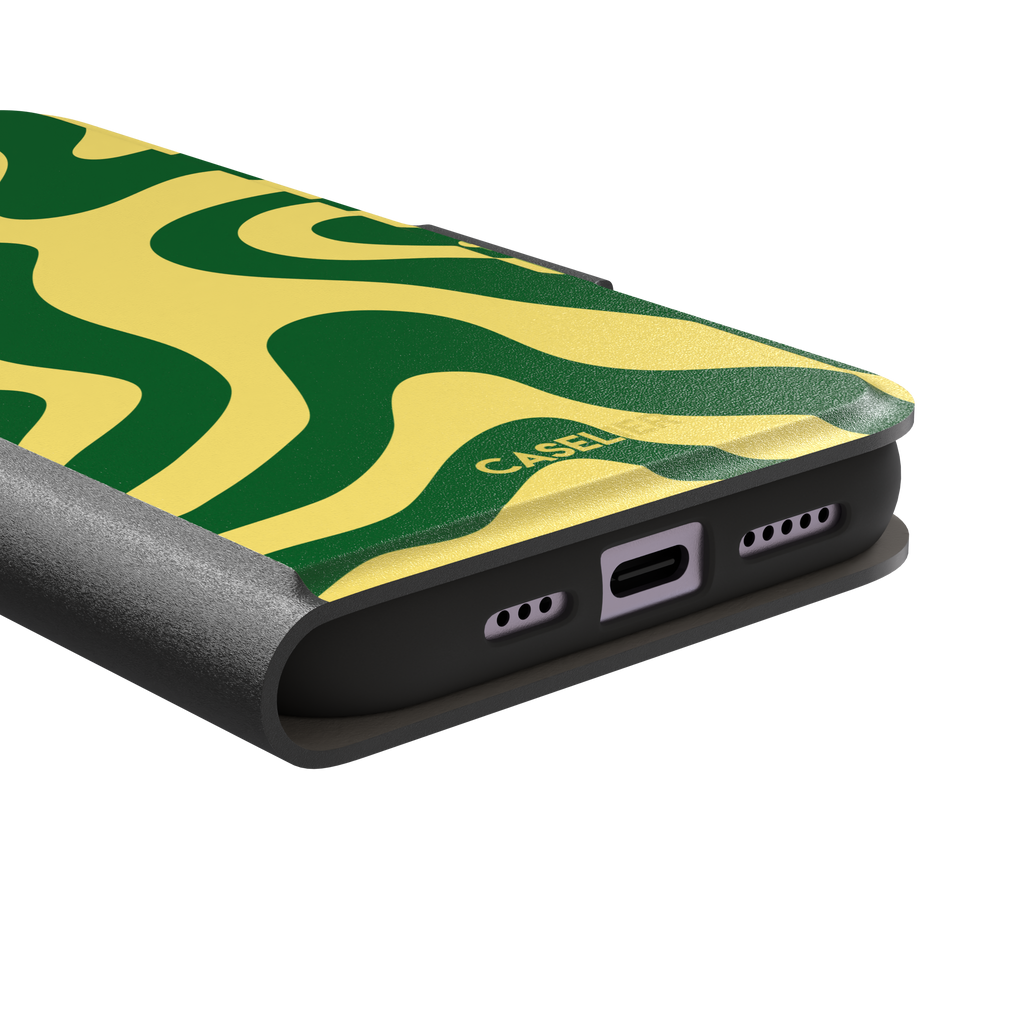 Wavey abstract phone case in yellow and deep green fluid swirl pattern, phone case by Caselier — wallet case, charging port detail