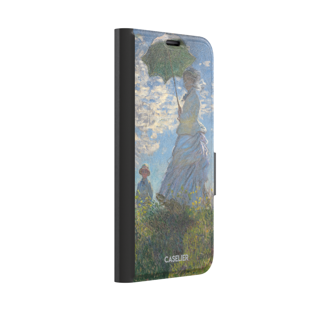 Woman with a Parasol by Claude Monet, showing a woman in a lavender dress holding a green parasol against a blue sky with a child in a wildflower field below — wallet case, left view