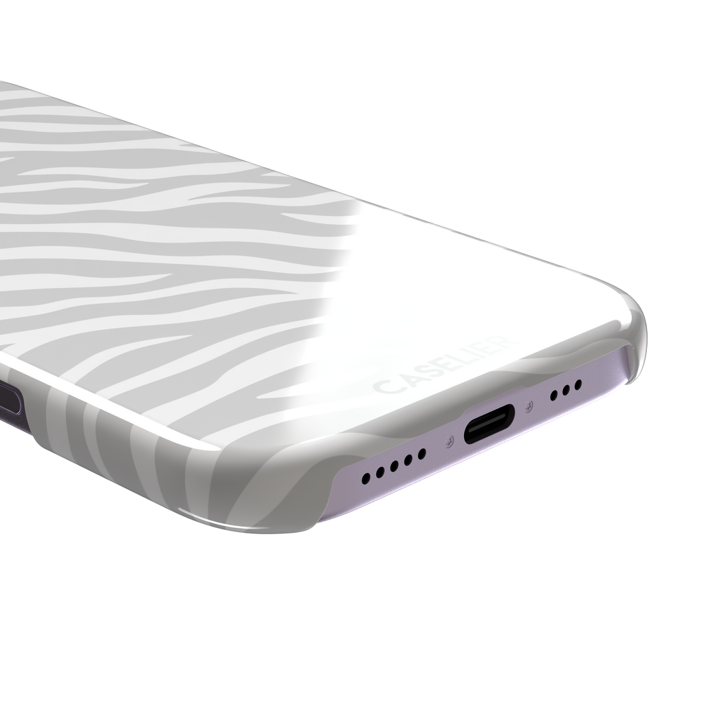 White on light grey zebra stripe phone case with all-over horizontal wave pattern, phone case by Caselier — snap case, charging port detail