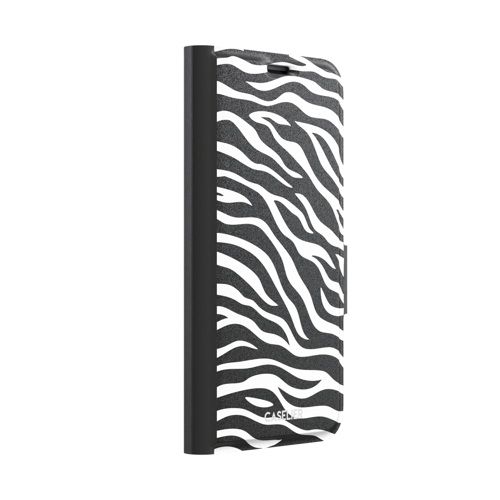 Black and white zebra stripe phone case with all-over horizontal wave pattern, phone case by Caselier — wallet case, left view