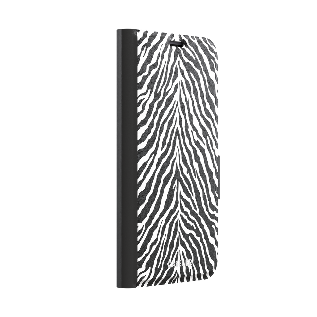 Black and white zebra stripe phone case with symmetrical radiating pattern, phone case by Caselier — wallet case, left view