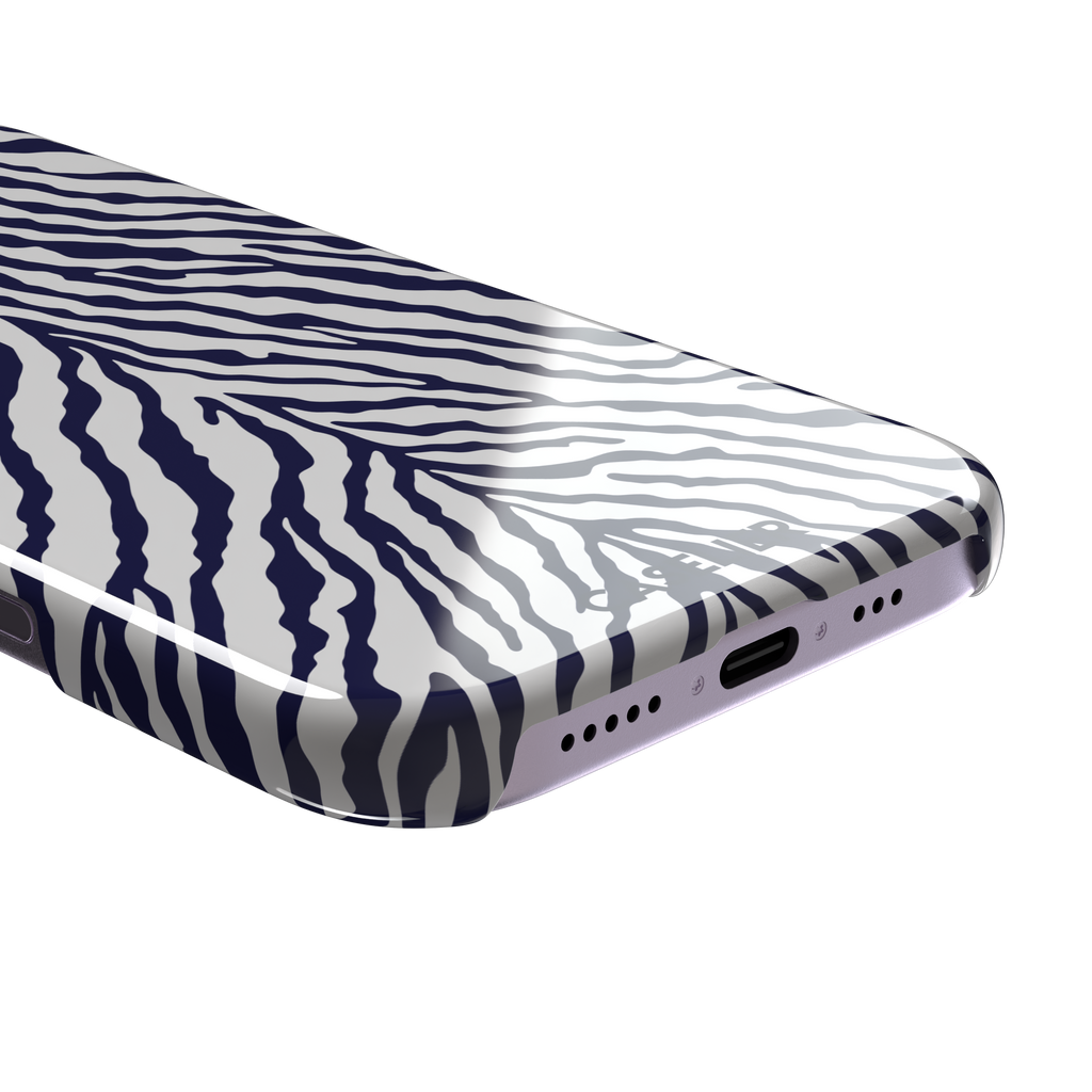 Navy blue and white zebra stripe phone case with symmetrical radiating pattern, phone case by Caselier — snap case, charging port detail