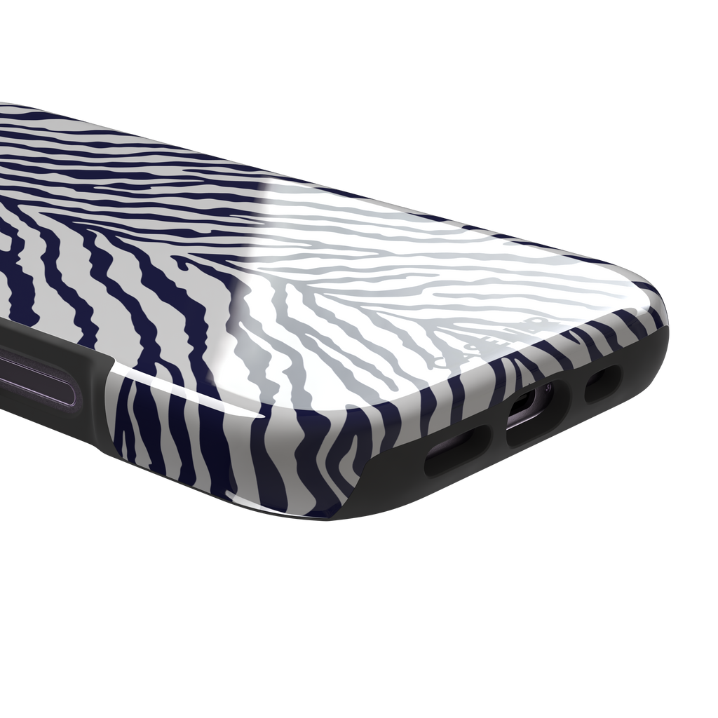 Navy blue and white zebra stripe phone case with symmetrical radiating pattern, phone case by Caselier — tough case, charging port detail